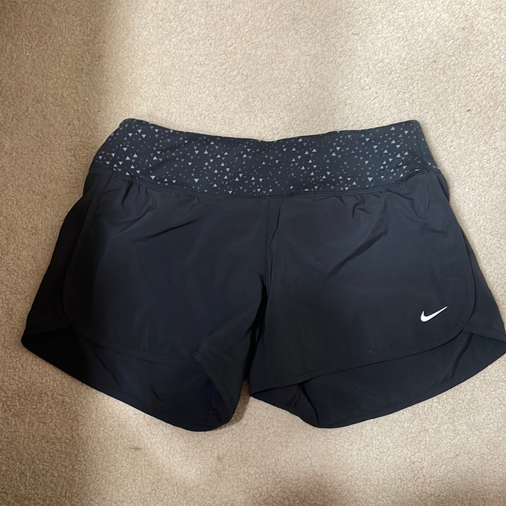Black Nike running shorts